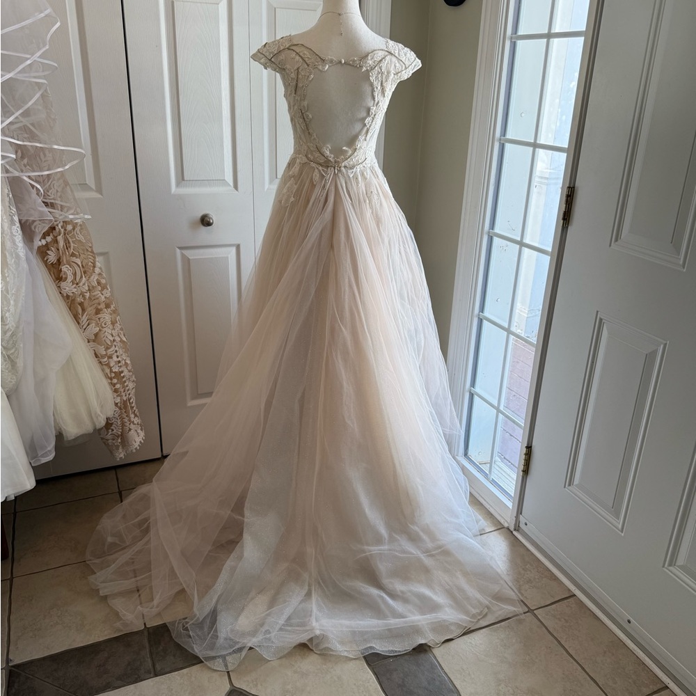 Vintage Galina Signature Cream and White Dress by David’s Bridal.